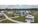 Aerial view of a park featuring a playground, walking paths, picnic shelters, and green spaces at 4617 Westford Cir, Tampa, FL 33618