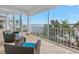 Relaxing balcony overlooking the water with wicker chairs at 5200 62Nd S Ave, St Petersburg, FL 33715