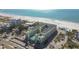 Aerial view of beachfront condo building and beach at 12000 Gulf Blvd # 212-N, Treasure Island, FL 33706