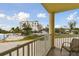 Relaxing balcony overlooking the pool and community at 12000 Gulf Blvd # 212-N, Treasure Island, FL 33706