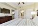 Bedroom with a king-size bed and ensuite bathroom at 12000 Gulf Blvd # 212-N, Treasure Island, FL 33706