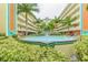 Central courtyard with fountain and lush landscaping at 12000 Gulf Blvd # 212-N, Treasure Island, FL 33706