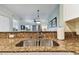 Double stainless steel kitchen sink with granite countertop at 12000 Gulf Blvd # 212-N, Treasure Island, FL 33706