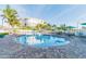 Inviting resort-style pool with ample seating at 12000 Gulf Blvd # 212-N, Treasure Island, FL 33706