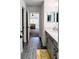 Modern bathroom with gray cabinets and a view into the bedroom at 19314 Eagle Creek Ln, Tampa, FL 33647