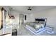 Bright bedroom with a large bed and plenty of sunlight at 19314 Eagle Creek Ln, Tampa, FL 33647