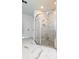 Spacious shower with marble walls and glass enclosure at 19314 Eagle Creek Ln, Tampa, FL 33647