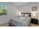 Guest bedroom with a queen-size bed, and plenty of natural light at 3471 Winona St, Port Charlotte, FL 33948