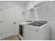 Clean laundry room, complete with washer and dryer at 3471 Winona St, Port Charlotte, FL 33948