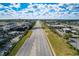 Aerial view of a multi-lane roadway and surrounding businesses at 36522 Well Hill Way, Zephyrhills, FL 33541