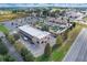 Aerial view of a retail building with adjacent parking at 36522 Well Hill Way, Zephyrhills, FL 33541