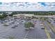 Large parking lot in front of shopping center anchored by Hobby Lobby at 36522 Well Hill Way, Zephyrhills, FL 33541