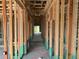 Interior shot of the frame, demonstrating the home's layout and construction in progress at 413 Shannon Estates Ct, Plant City, FL 33563