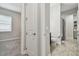 Clean bathroom with toilet and shower, near bedroom at 8321 Sky Eagle Dr, Tampa, FL 33635