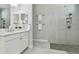 Modern bathroom with a large walk-in shower and white vanity at 8321 Sky Eagle Dr, Tampa, FL 33635