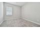 Spacious bedroom with neutral walls and carpet at 8321 Sky Eagle Dr, Tampa, FL 33635