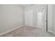 Simple bedroom with neutral walls and carpet at 8321 Sky Eagle Dr, Tampa, FL 33635