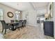 Dining room features a six-chair table and access to the living room at 8321 Sky Eagle Dr, Tampa, FL 33635