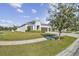 Two-story house with landscaped yard and driveway at 8321 Sky Eagle Dr, Tampa, FL 33635