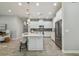 Modern kitchen with white cabinets, stainless steel appliances, and quartz countertops at 8321 Sky Eagle Dr, Tampa, FL 33635