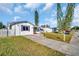 Charming single story home with purple accents at 1415 Yale Dr, Holiday, FL 34691