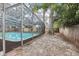 Charming backyard features a refreshing pool, fully enclosed with screen, offering a private retreat at 14160 82Nd Ter, Seminole, FL 33776