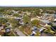 Aerial view of a residential neighborhood showcasing houses and tree-lined streets at 14915 Gentilly Pl, Tampa, FL 33624