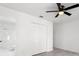 Bedroom with double door closet and view of bathroom at 14915 Gentilly Pl, Tampa, FL 33624