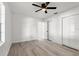 Bright bedroom with ceiling fan and window at 14915 Gentilly Pl, Tampa, FL 33624