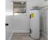 Laundry area with water heater and shelving at 14915 Gentilly Pl, Tampa, FL 33624