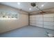 Bright garage with automatic garage door and painted floor at 920 Hull S St, Gulfport, FL 33707