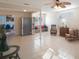 Bright living room with tile floors and adjacent kitchen view at 920 Hull S St, Gulfport, FL 33707