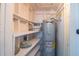 Shelved pantry with water heater and storage space at 920 Hull S St, Gulfport, FL 33707