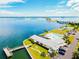 Community waterfront view with pool and clubhouse at 5 Gateshead Dr # 203, Dunedin, FL 34698