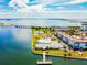 Community pool and tennis courts with waterfront access at 5 Gateshead Dr # 203, Dunedin, FL 34698