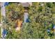 Aerial view showing house and surrounding trees at 106 S Nimbus Ave, Clearwater, FL 33765