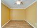 A bedroom with a ceiling fan and plank flooring at 12006 Stone Crossing Circle, Tampa, FL 33635