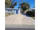 Long driveway leading to the house entrance at 13625 120Th St, Largo, FL 33778