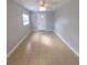 Bright living room with tile floors and ceiling fan at 13625 120Th St, Largo, FL 33778