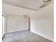 This bedroom features wood-look flooring, fresh white paint, and a modern mini-split air conditioning unit at 5028 School Rd, Land O Lakes, FL 34638