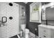 Modern bathroom with subway tile and glass shower at 554 6Th N Ave, St Petersburg, FL 33701