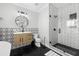 Bathroom with white subway tile shower and hexagon floor tile at 554 6Th N Ave, St Petersburg, FL 33701