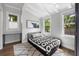 Bright bedroom with a double bed and stylish decor at 554 6Th N Ave, St Petersburg, FL 33701