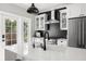 Modern kitchen with black hexagon tile backsplash and stainless steel appliances at 554 6Th N Ave, St Petersburg, FL 33701