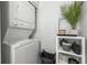 Stackable washer and dryer in a small laundry room at 554 6Th N Ave, St Petersburg, FL 33701