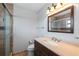 Bathroom with a vanity, toilet, and walk-in shower at 8814 Bay Pointe Dr # 204, Tampa, FL 33615