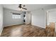 Bright bedroom featuring in-unit laundry and wood flooring at 8814 Bay Pointe Dr # 204, Tampa, FL 33615