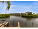 Community boardwalk with boat docks and serene waterfront views at 8814 Bay Pointe Dr # 204, Tampa, FL 33615