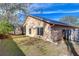 Spacious backyard with grassy area and wooden fence at 2529 Clareside Dr, Valrico, FL 33596