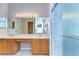Bathroom with double sinks, wood cabinets and shower at 2529 Clareside Dr, Valrico, FL 33596
